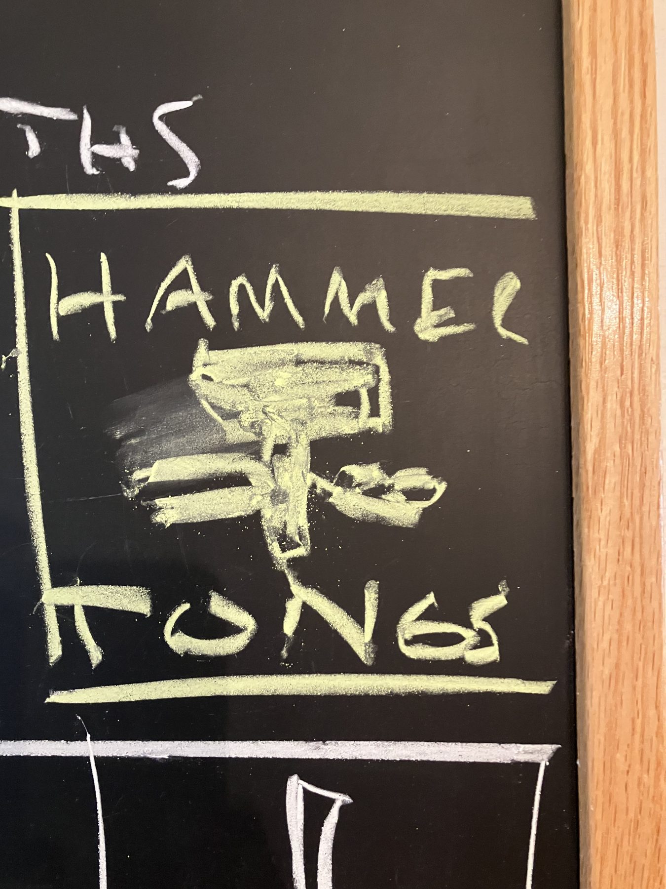 Chalk drawing of the Hammer & Tongs mark