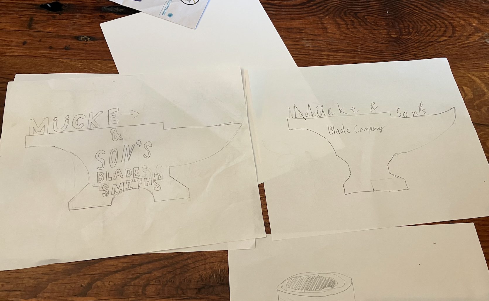 Anvil-shaped logo sketches