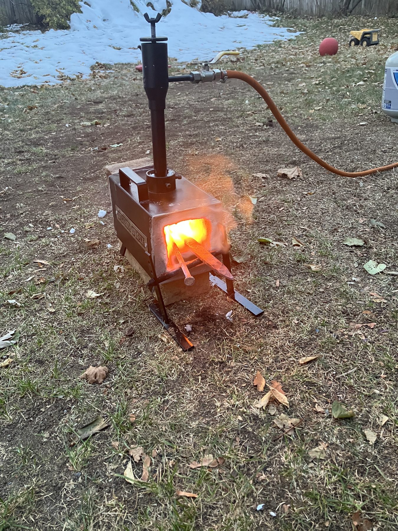 Forge glowing outside in the snow
